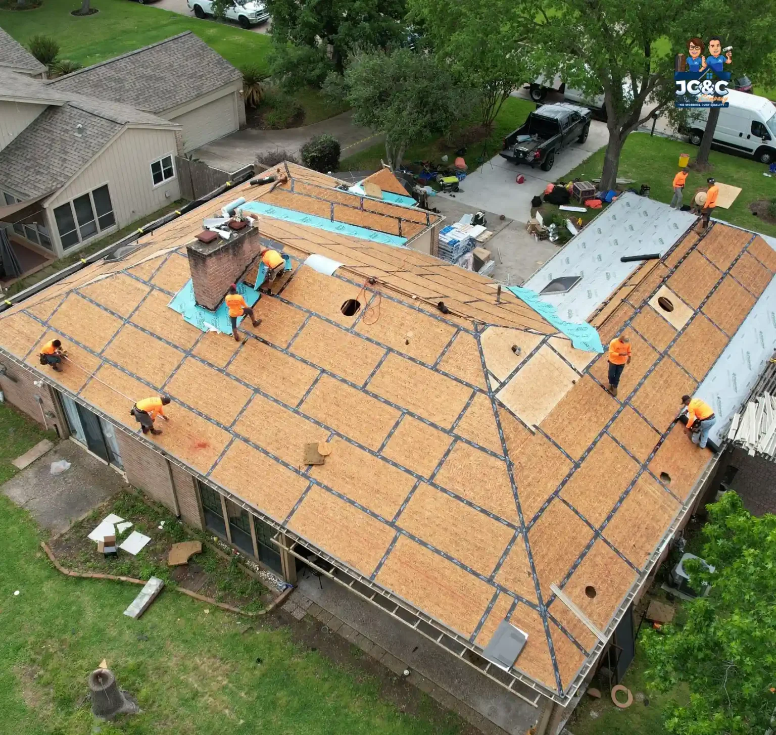 JC&C Roofing Company crew working on a residential roof in Waller County, TX