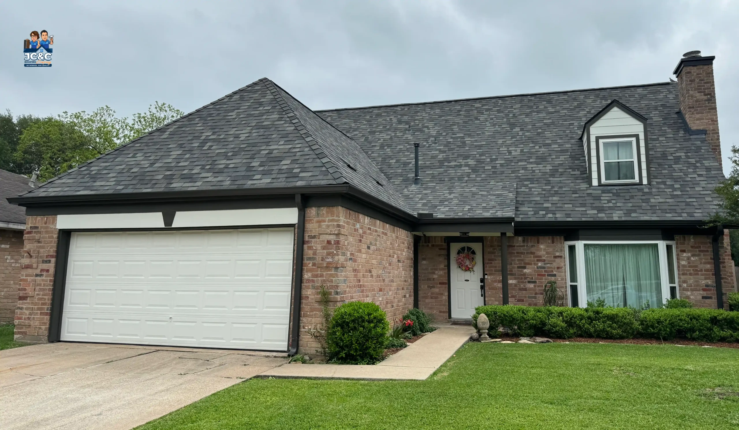 Beautiful front house with new roof and gutters in Sugar Land by JC&C