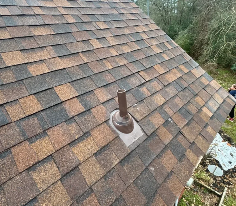 plumbing vent repaired with matching shingles