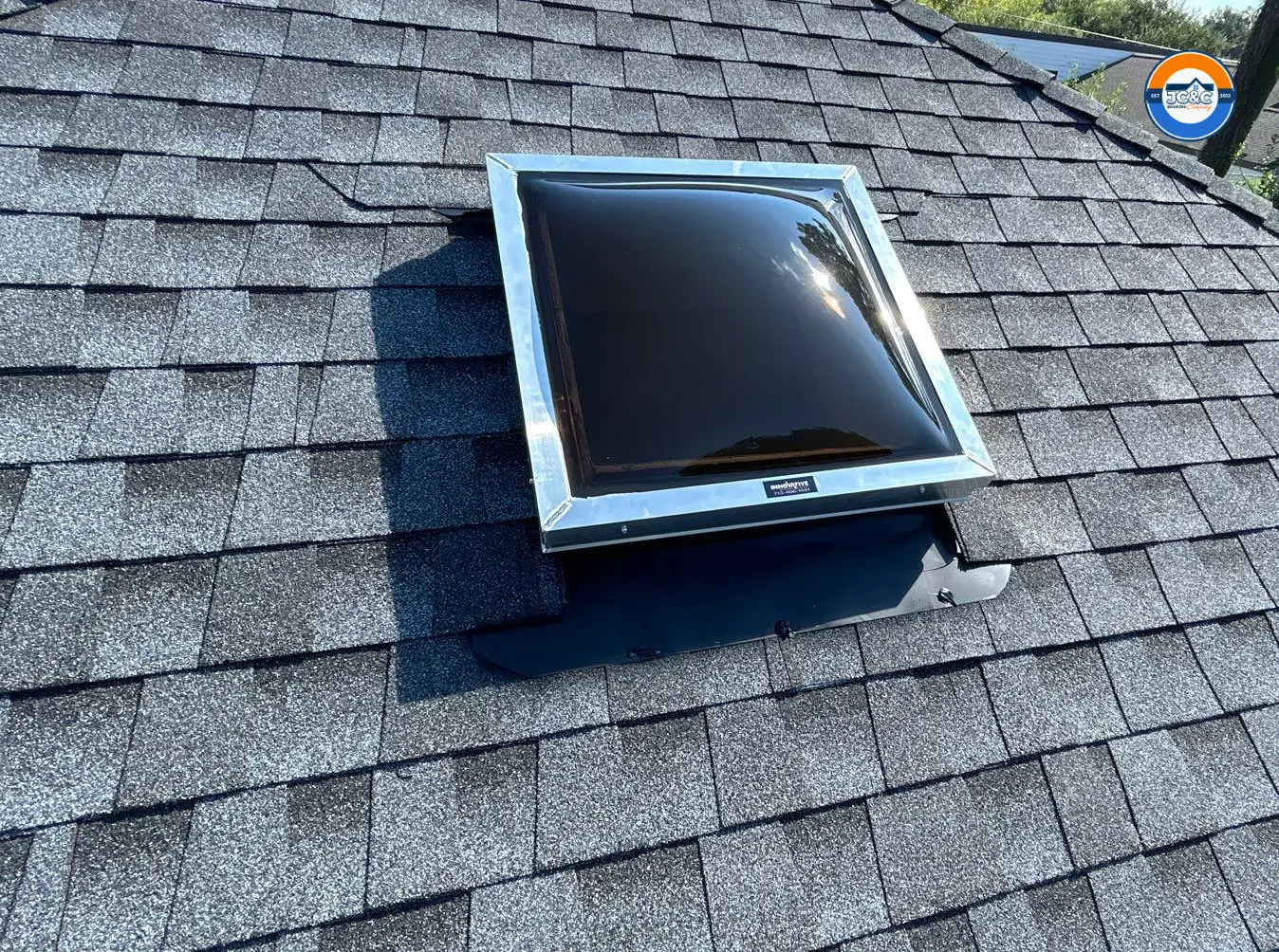 Skylight roof repaired and skylight replaced in commercial office - JC&C Roofing