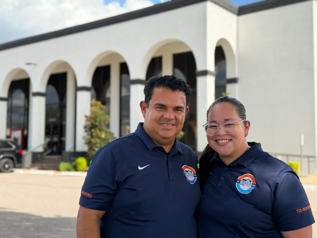 Christian and Jennifer Hernandez, founders of JC&C Roofing Company, outside their Tomball office