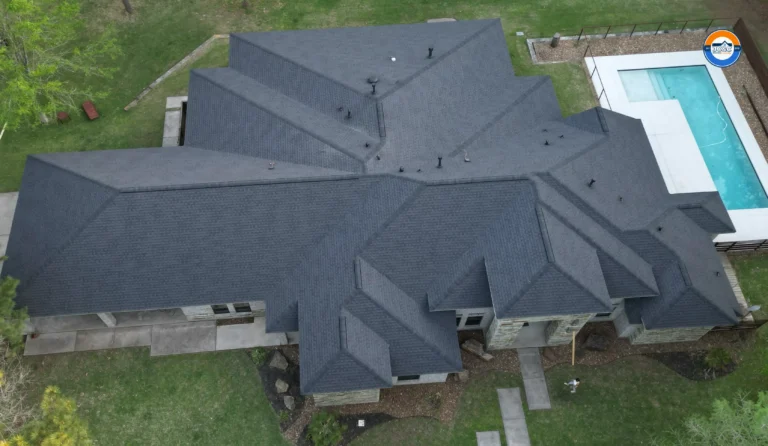 Completed roof installation on a large home in Magnolia, Texas